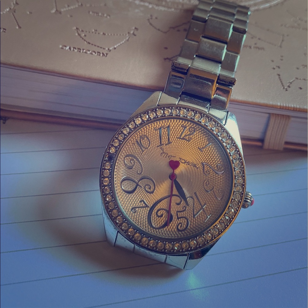 Betsy Johnson silver tone watch.